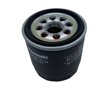 A Kawasaki engine oil filter with a black body, silver metal top, and white printed brand and part number markings, shown on a plain light gray background. 49065-0734 - OIL FILTER - KAWASAKI ENGINE PARTS