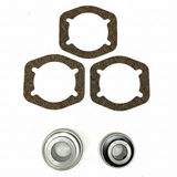 A set of mechanical parts on a white background, including three dark brown textured gaskets, two metal bearings. BK-201HDB-AM - HD 1.25" BEARING KIT - FRONT/REAR (2010-2017) - AFTERMARKET