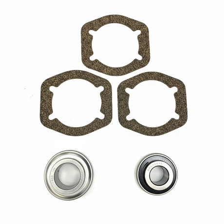 A set of mechanical parts including three dark brown textured gaskets, two small blue screws, and two metal ball bearings on a plain white background. BK-301HDB-AM - HD 1.375" BEARING KIT - FRONT/REAR (2017+) - AFTERMARKET