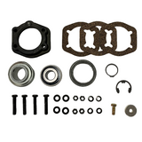 A mechanical parts kit laid out on a white background, including a black circular ring, four brown textured gaskets, two metal bearings, several black washers and clips, plus screws and a small brass-toned bolt. BK-311HDB-AM - HD 1.375" BEARING & FLANGE KIT - FRONT/REAR (2017+) - AFTERMARKET